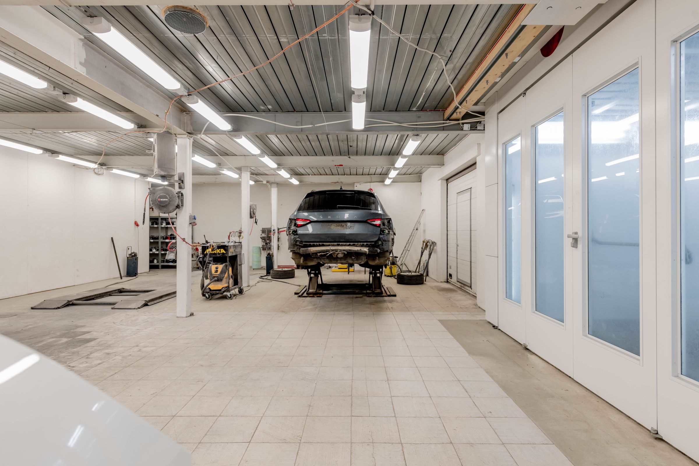 a clean, well-lit auto repair bay